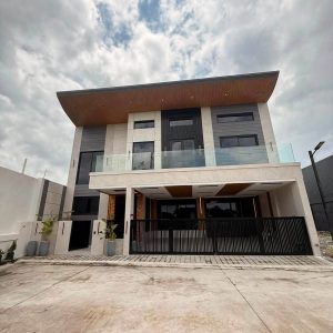 Modern 5-Bedroom Home with Pool Near Clark Front View